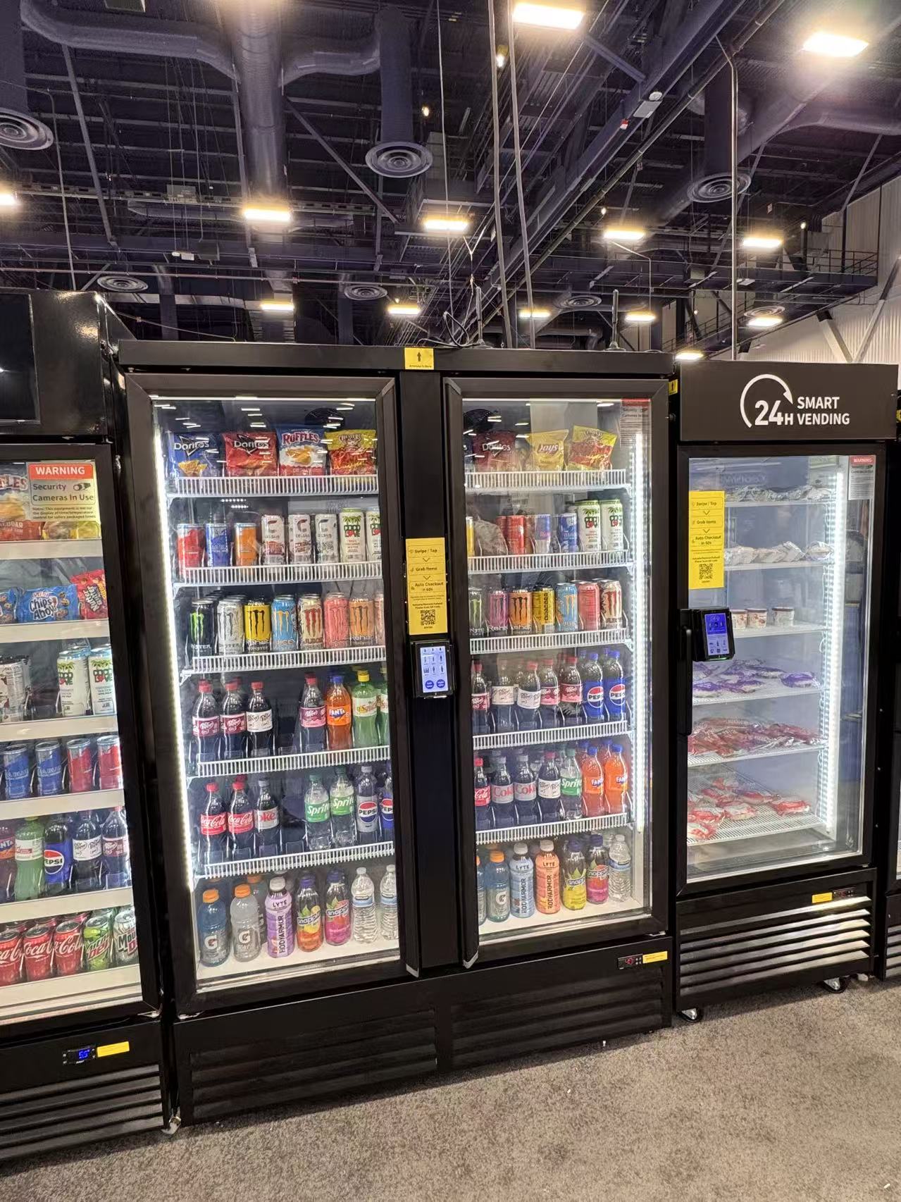 Smart vending coolers stocked with drinks and snacks